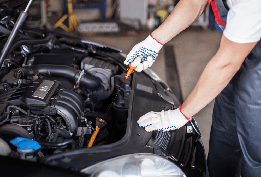 Oil change service being performed at Saguaro Alignment and Brakes in Phoenix, AZ