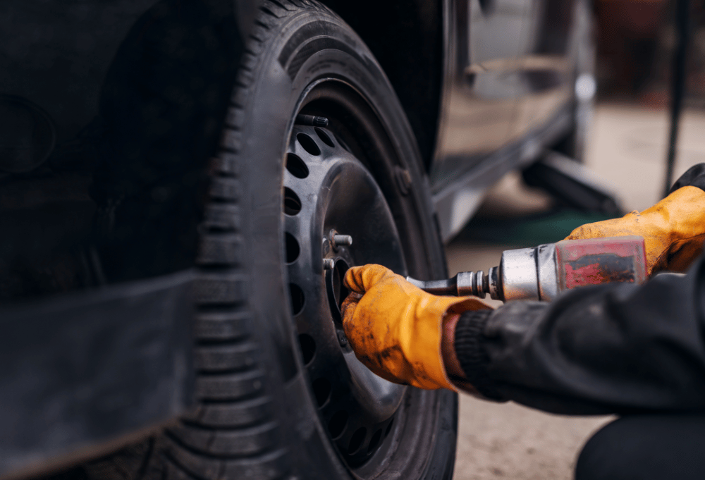 Tire rotation service being performed at Saguaro Alignment and Brakes in Phoenix, AZ